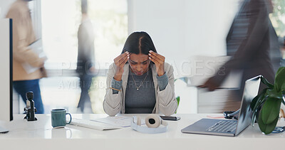 Stress, anxiety and woman at desk in busy office with headache, laptop or deadline crisis. Mental health, business and professional girl with computer, paperwork and burnout chaos at creative startup