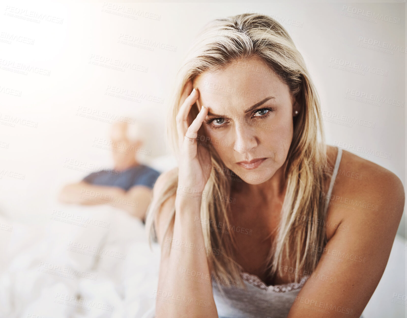 Buy stock photo Mature couple, woman and angry on bed in home with stress, frustrated and argument in marriage. Infidelity, person and portrait with conflict, relationship fail and ignore partner in bedroom of house