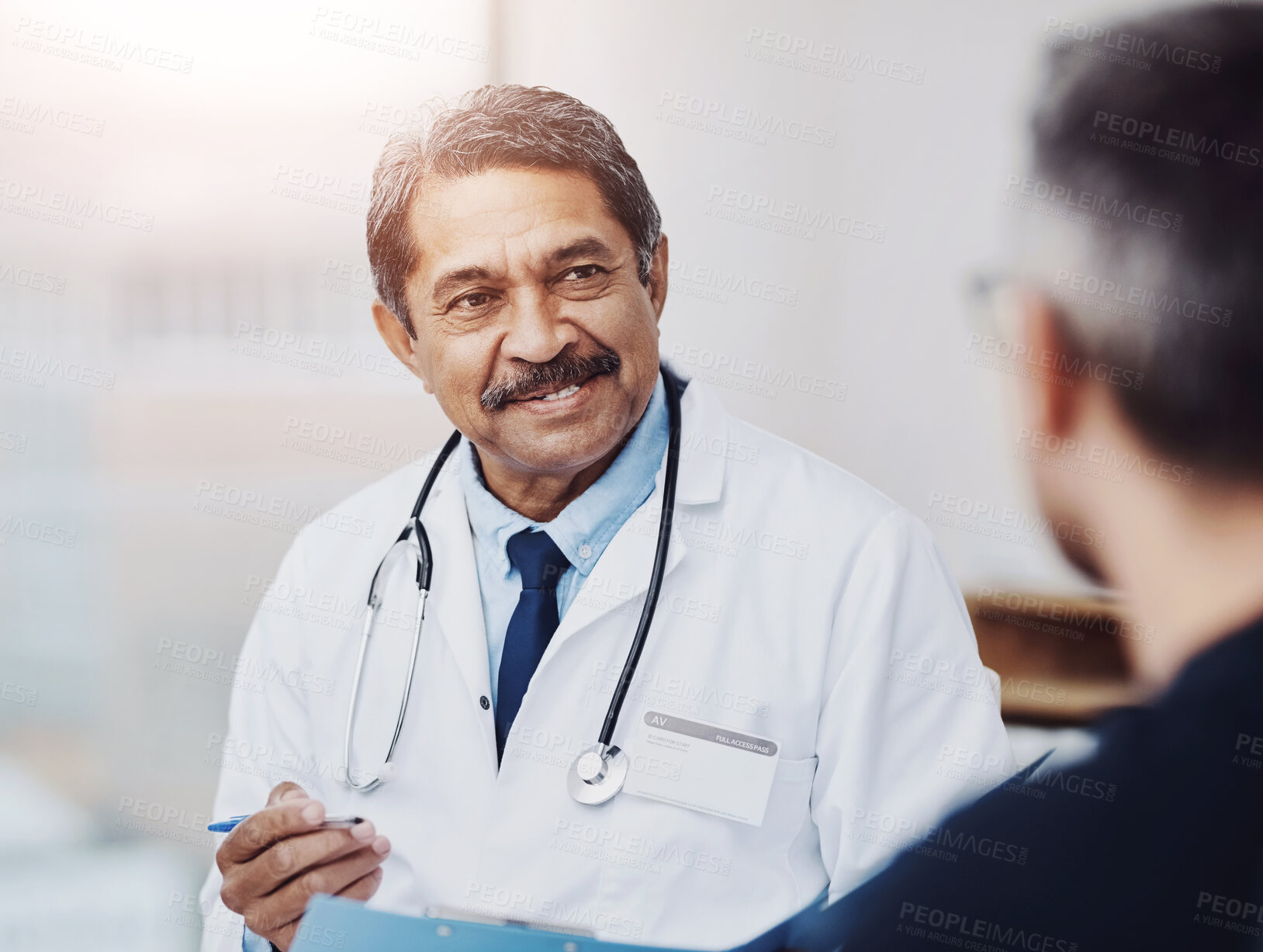 Buy stock photo Healthcare, mature man and patient with checklist for consultation, questions and medical notes. Appointment, doctor and cardiologist with smile for advice, diagnosis results or information in clinic