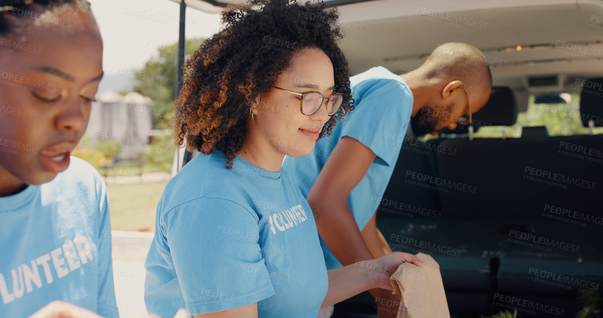 Buy stock photo Volunteer, teamwork and people with food package for charity event, donation and community programme. Collaboration, volunteering and men and women with van for parcel, bags and grocery distribution