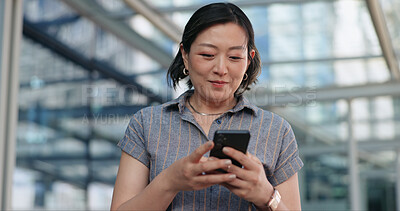 Woman, texting and commute to work, city and smartphone, conversation and technology. Happy, japanese and check email in urban area, office buildings and businesswoman for networking and chat