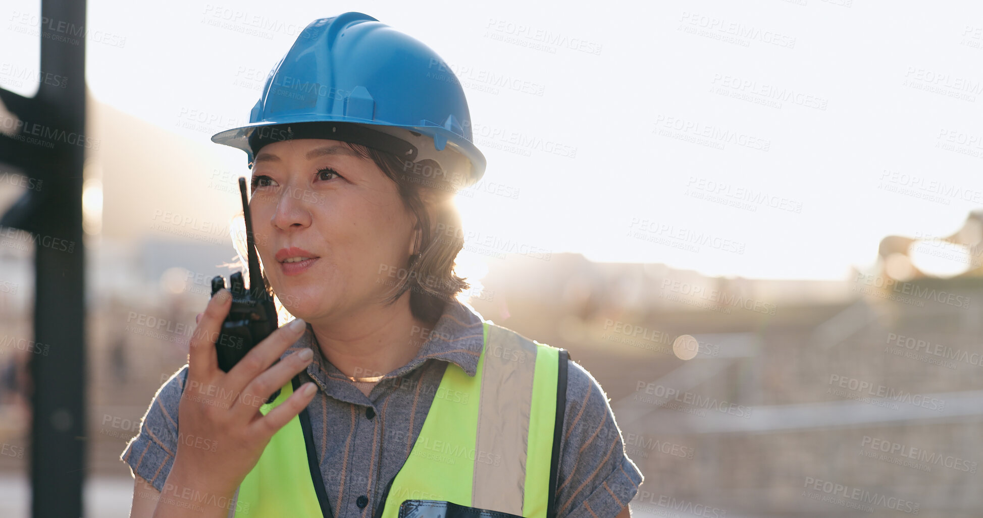 Buy stock photo Woman, construction and inspection with radio for communication, Japanese supervisor and lens flare. Check building site, walkie talkie and engineer in Japan, architecture and project management