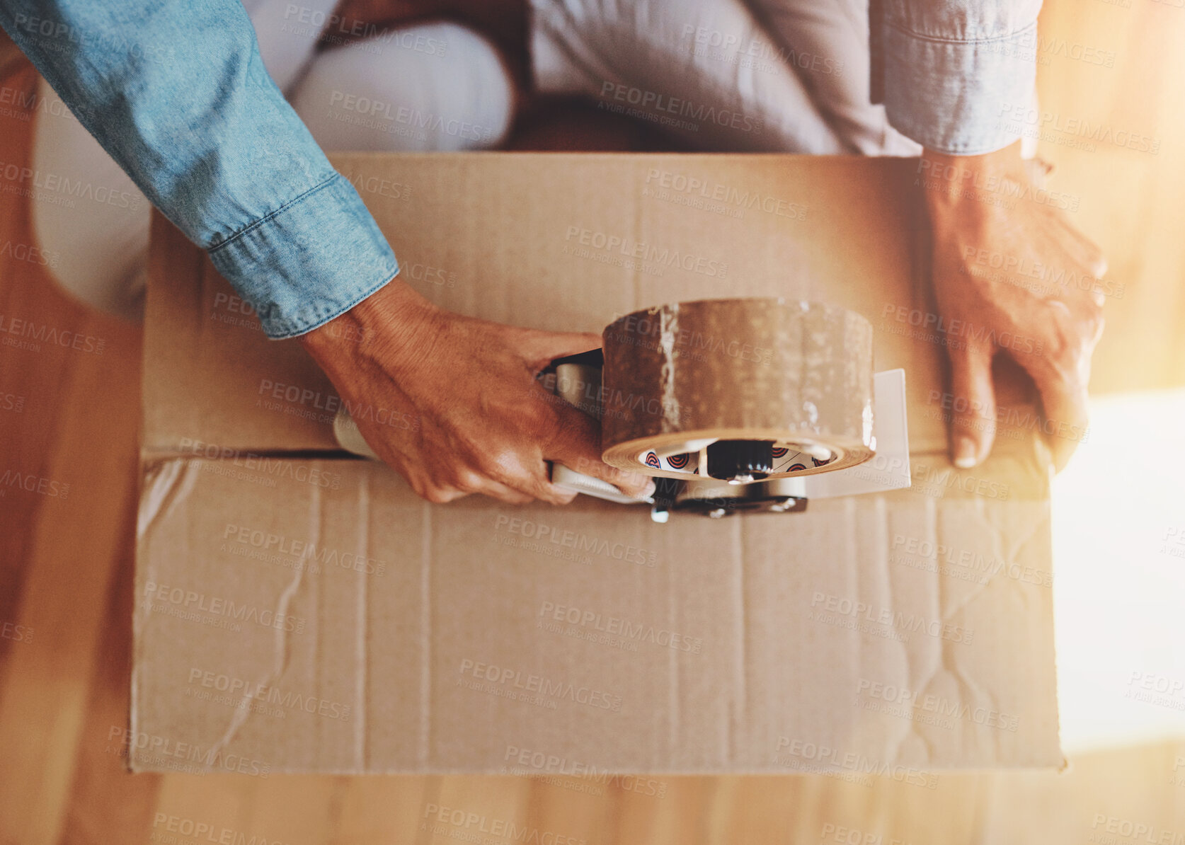 Buy stock photo Hands, box and tape in home for moving with package, seal or ready for immigration on floor. Person, cardboard container and relocation for fresh start, property or investment in real estate in Spain