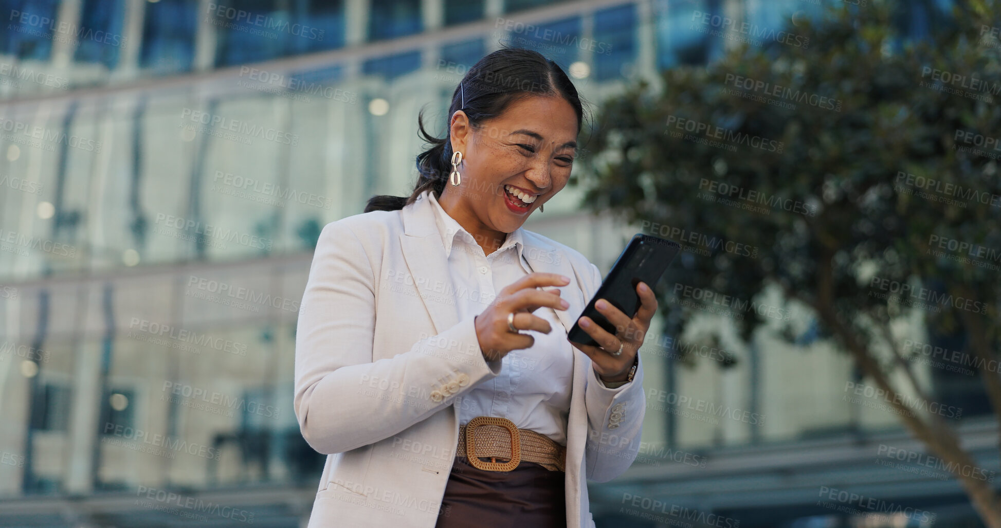 Buy stock photo Business, phone and happy woman with winner fist celebration in a city with news, success or results. Yes, hands and excited investor with investment growth alert, email or competition prize in Tokyo