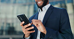 Businessman, hands and typing with phone in city for communication, social media or outdoor networking. Closeup of man or employee smile with mobile smartphone for online chatting or texting in town