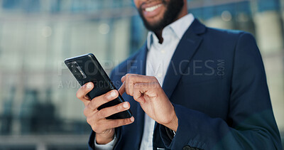 Businessman, hands and typing with phone in city for communication, social media or outdoor networking. Closeup of man or employee smile with mobile smartphone for online chatting or texting in town