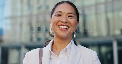 Japanese business woman, face and city with smile, confidence and pride for career by office buildings. Person, corporate employee and outdoor on metro street for commute, travel and happy in Tokyo