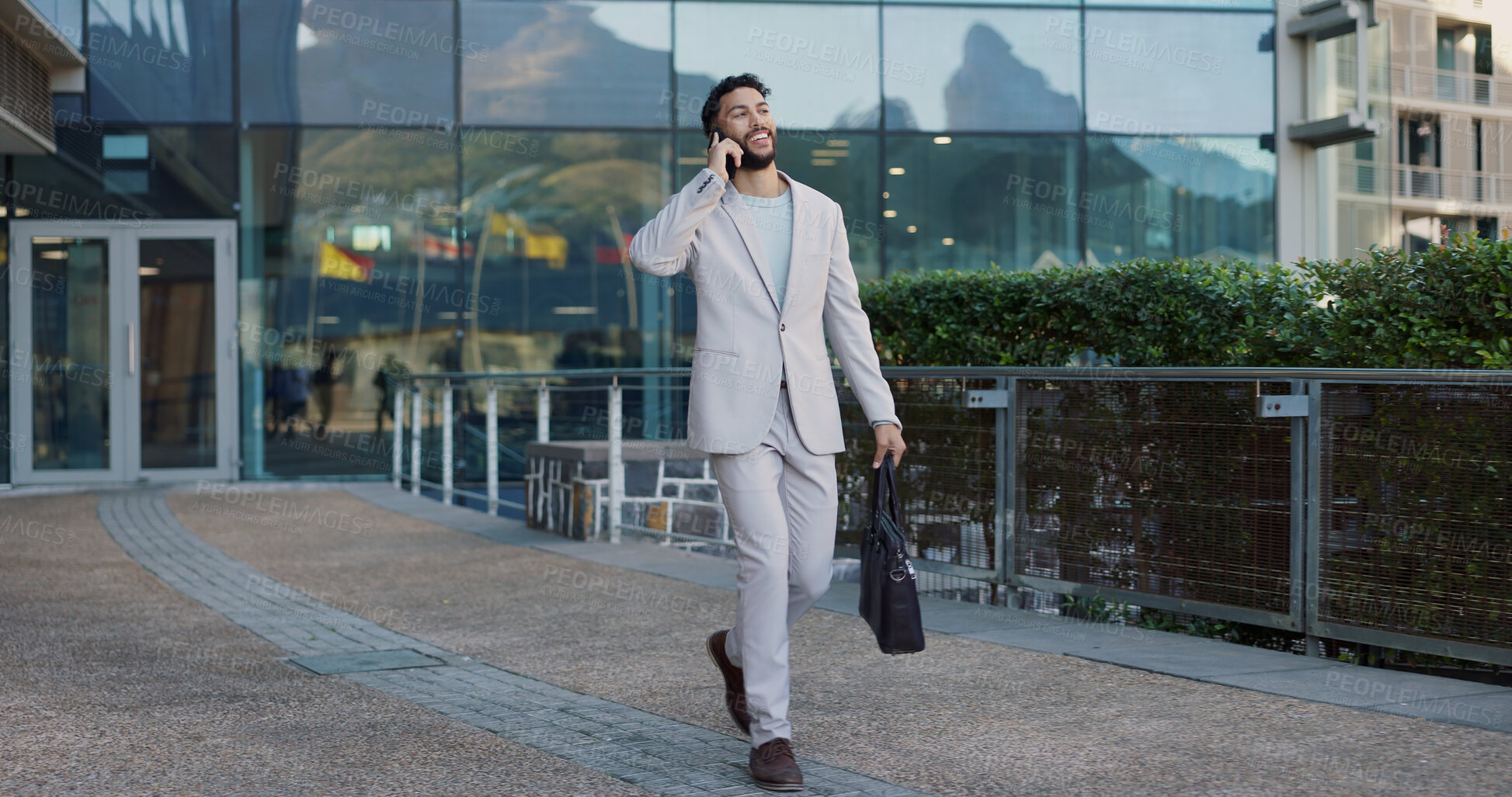 Buy stock photo Business man, city and phone call with attorney briefcase and bag with networking and conversation. Urban, travel and morning commute with mobile communication and happy walking in town with tech