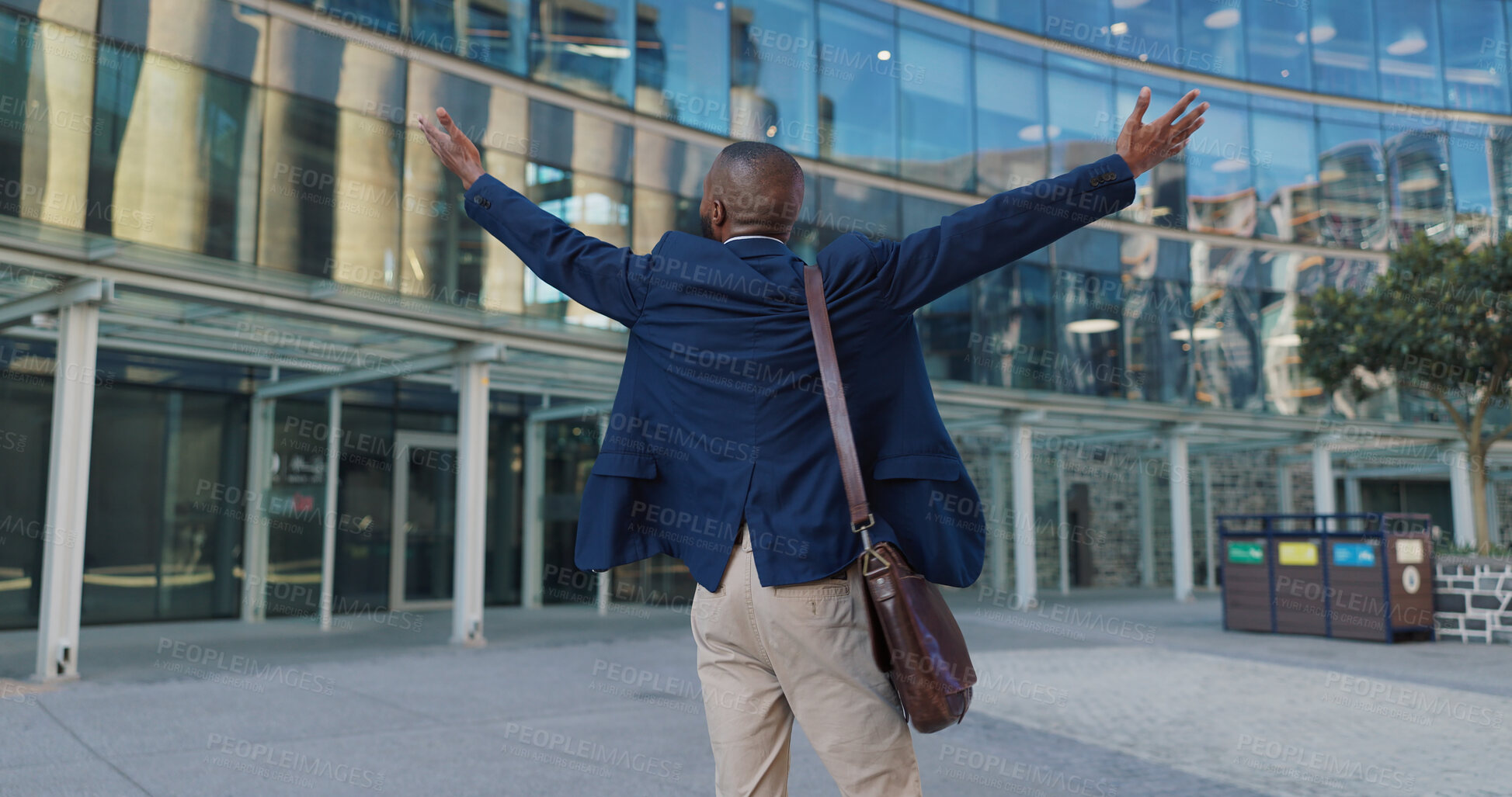 Buy stock photo Business man, freedom and excited in city for travel, opportunity and celebration outdoor. Professional African winner, lawyer or worker by urban building with wow, hands and arms up for gratitude