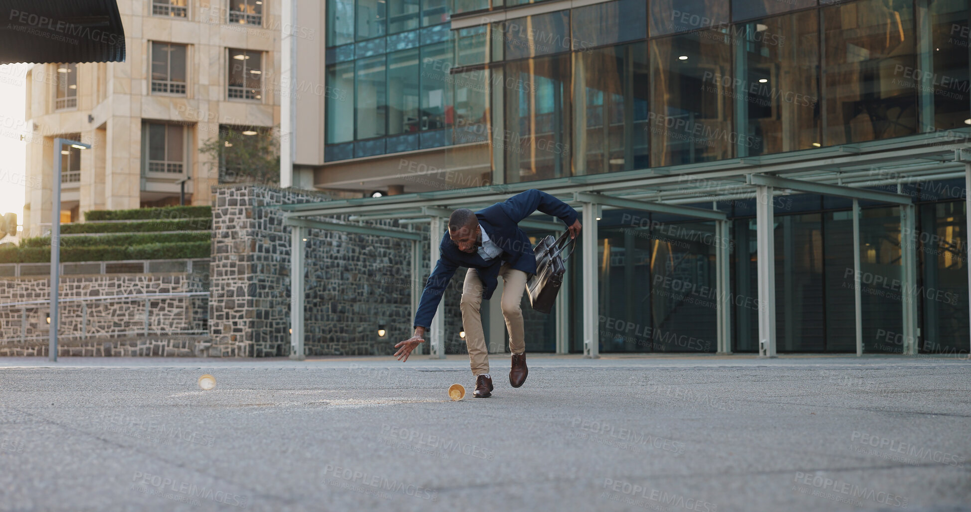 Buy stock photo Business man, street and spill coffee with mistake, walking and anger with trip, schedule and outdoor in city. African person, employee and stress with mess for drink on sidewalk by office building