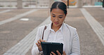 Asian woman, business and browsing with tablet in city for research, social media or outdoor networking. Female person or employee with smile on technology for online search, web or internet in town