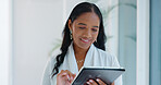 Business woman, tablet and reading in hallway at modern office with communication, vision and networking. Person, touchscreen and typing with thinking, application and problem solving in workplace