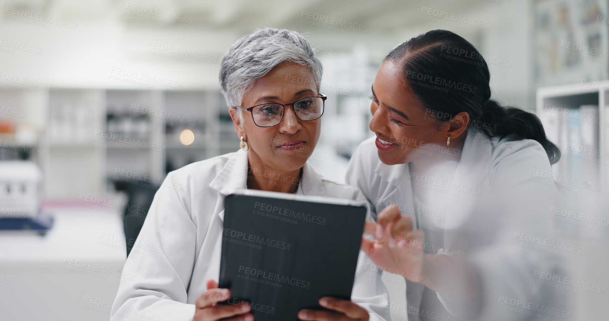 Buy stock photo Science, research and team of women with tablet for medical study, results or online review. Digital app, advice and scientist in laboratory with technician for consultation on pharmaceutical website