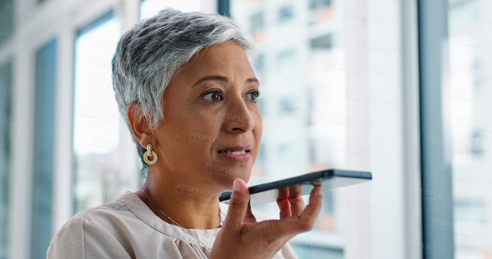 Buy stock photo Business, loudspeaker and phone call with senior woman, connection or communication in a workplace. Mature person, employee or PR consultant with smartphone or voice note with contact or conversation