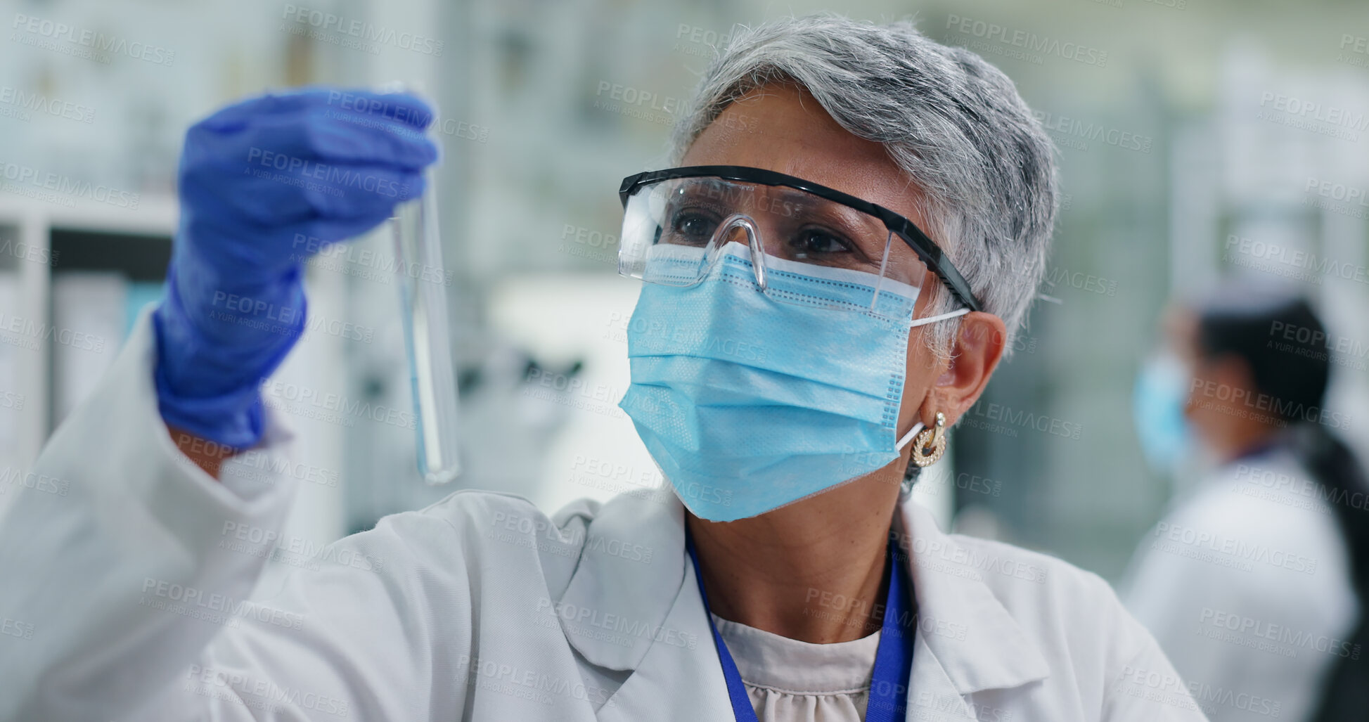 Buy stock photo Woman, chemical in test tube and senior scientist in lab, chemistry and medical research for pharmacy and investigation. Biotech, science experiment and doctor in face mask with glass for liquid