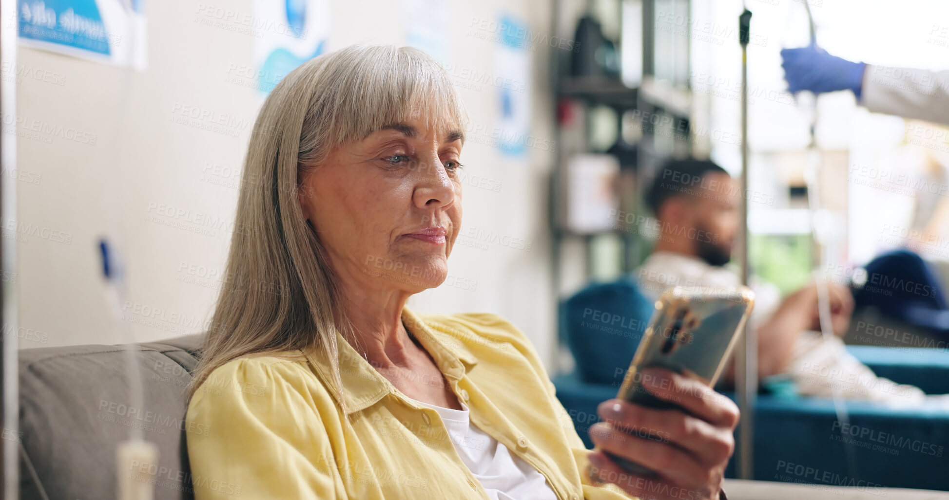 Buy stock photo Hospital, phone and senior happy woman in chemotherapy for cancer treatment, medication and IV drip of medicine. Healthcare, clinic and person on smartphone for social media, website and funny joke