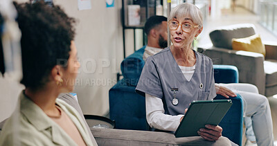 Senior woman, nurse and consulting patient with tablet for prescription, diagnosis or results at hospital. Female person and scrub talking to client on technology for appointment or checkup at clinic