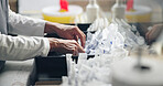 Doctor, medicine and inventory sorting with hands and IV bags for hospital and stock check at clinic. Dispensary, pharmacist and healthcare worker with supplements, drugs and prescription search