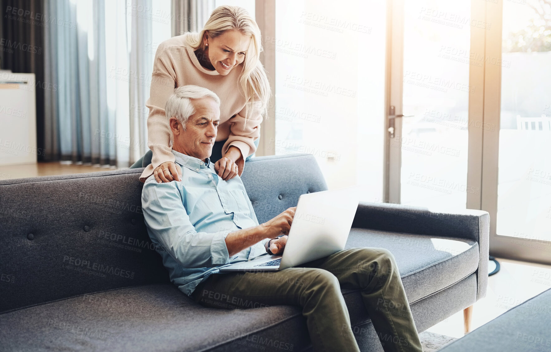 Buy stock photo Laptop, internet and mature couple on couch with asset management research, planning and investment in home. Lounge, woman and man with computer for life insurance admin, online faq and article info