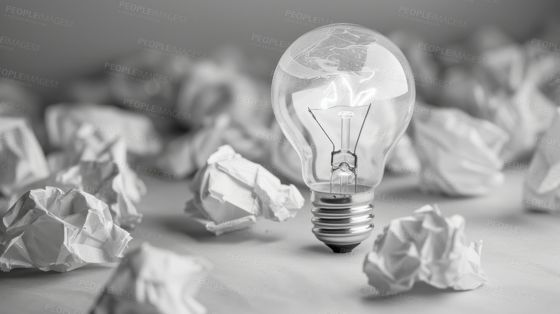 Buy stock photo Lightbulb, ideas and crumpled paper for creative solution, writing and brainstorming on desk. Research, planning and inspiration with power, goal or problem solving for startup project or career