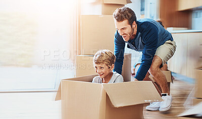 Buy stock photo New home, dad or child in box for play, game or car fantasy in living room. Happy boy, father and break from moving for support, property investment or real estate opportunity for family house