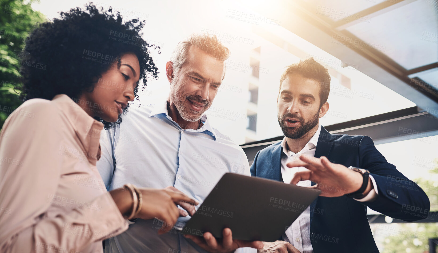 Buy stock photo Business people, laptop and group with discussion in office with reading, pointing and diversity at insurance agency. Men, woman and computer in scrum, review and feedback for risk assessment project