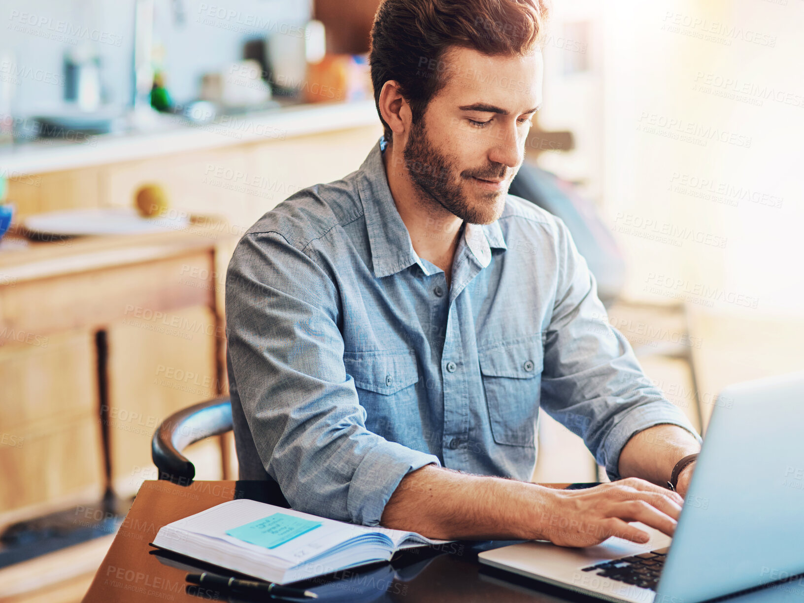 Buy stock photo Laptop, kitchen and man reading in home with notebook for research on stock exchange for investment. Computer, information and male trader with online financial market for asset purchase in house.