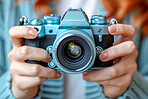 Woman, hands and camera for photography or picture from digital technology for travel as creative journalist. Vintage, female person and photographer in focus with lens for  memories or film with art