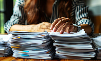 Woman, documents and paper stacked on desk for work in home office for research in company. Lawyer, notes and files for clients at firm with consent for consult with legal advice with working late