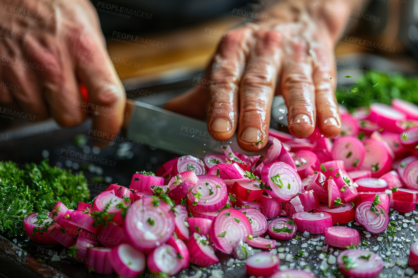 Buy stock photo Person, hands and knife with vegetables or salad for cooking in home kitchen with radish, nutrition or parsley. Fingers, chopping and prepare healthy food at counter or hungry, ingredient or diet