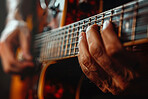 Person, hands and guitar playing for music career or creative performance, concert or rhythm. Fingers, instrument and acoustic production for audio composer or band artist for sound, show or solo