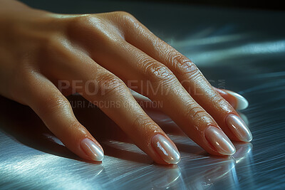 Woman, hand or manicure in closeup for art or beauty, treatment on nails at spa. Female person or fingers with zoom and luxury at salon, cosmetic on metal or texture for self care or wellness