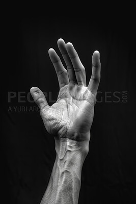Studio, reach and hand of man for support, faith and hope for connection with mental health. Power, touch and gratitude with strong arm on black background for help with trauma, stress and anxiety