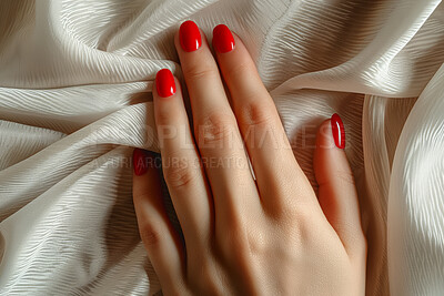 Touch, fabric and hand with nail polish, manicure and glamour for care, shiny and soft in spa. Cosmetics, treatment and glow in skin, beauty and red paint, aesthetic and relax in salon for luxury
