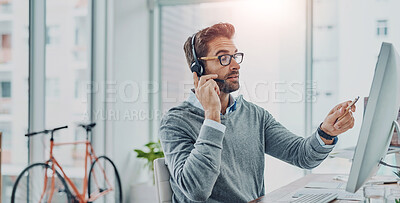 Buy stock photo Call center, consultant and man talking advice and insurance consulting with internet telemarketing sales in agency office. Young, computer and male employee working on customer service for support