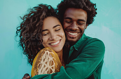 Buy stock photo Hug, love and smile with face of couple in studio isolated on blue background. Affection, emotion or romance with happy young man and woman embracing for bonding, date or relationship together