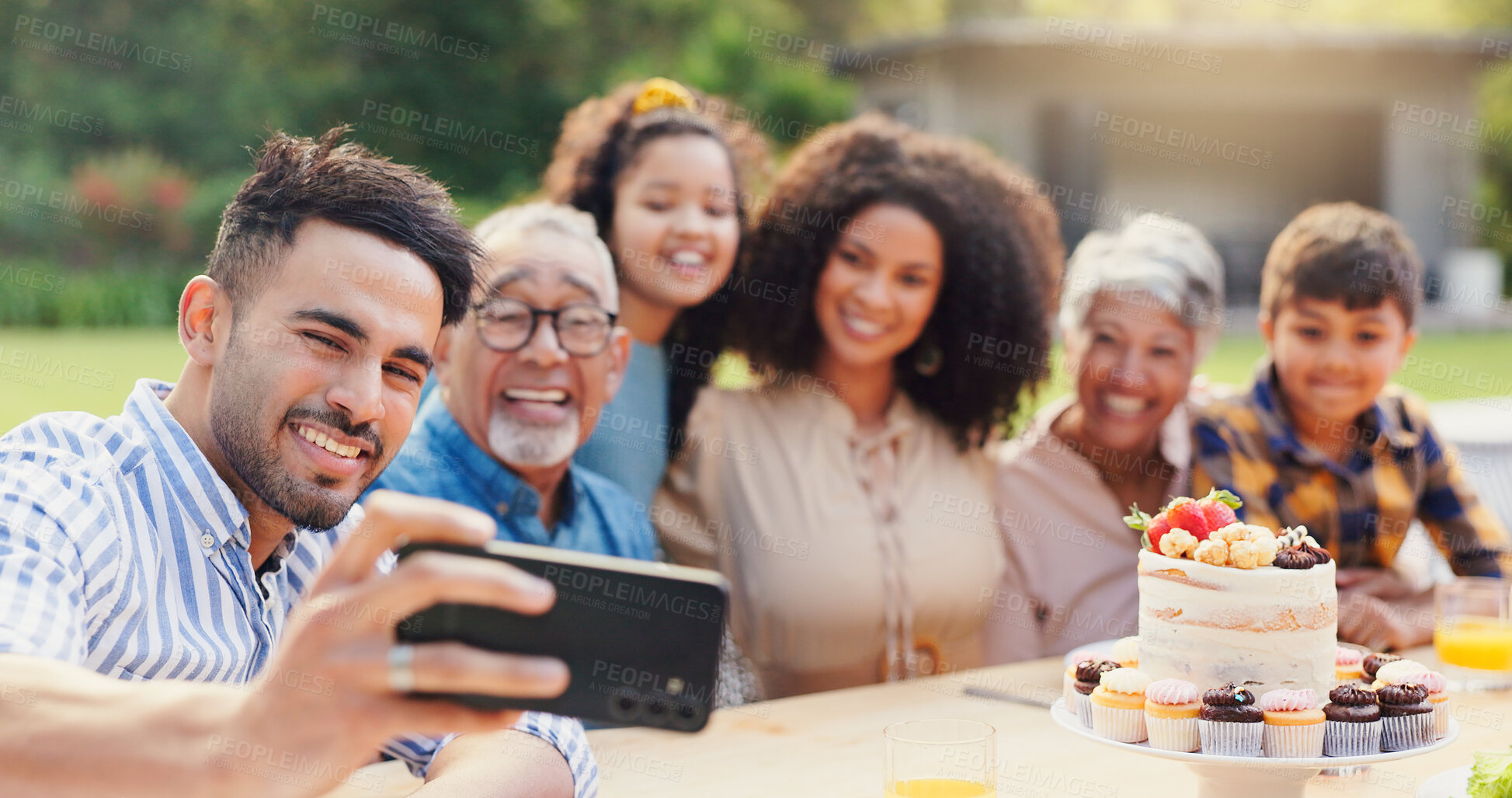 Buy stock photo Selfie, family and birthday in backyard with happy, social media and grandparents outdoor. Home, smile and table with celebration and party cake in garden with parents and kids with love and food