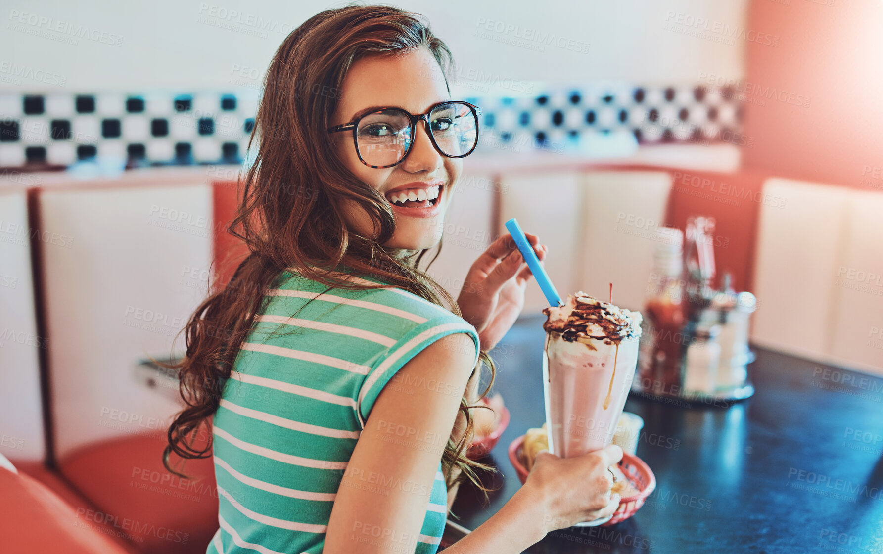 Buy stock photo Restaurant, smile and portrait of woman with milkshake, strawberry smoothie and chilling in weekend. Cafeteria, happy girl and creamy beverage for refreshment, enjoying and taste of nutrition