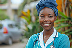 Nurse, portrait and smile with stethoscope for health, wellness and healthcare services outdoor. African woman, closeup and happy for medical care, work and emergency with equality or opportunity