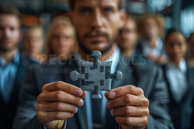 Businessman, hands and puzzle with piece for team building, problem solving or solution at office. Closeup of man or employee holding jigsaw, shape or square for complex brainstorming at workplace