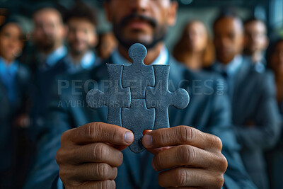 Businessman, hands and team with puzzle piece for problem solving, building or solution at office. Closeup of man or employee holding jigsaw, shape or square for complex brainstorming at workplace