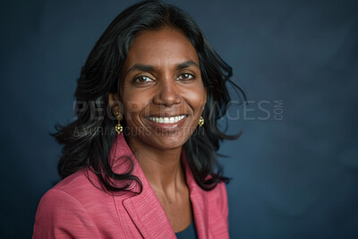 Happy, portrait and business Indian woman in studio as management consultant, supervisor and sales advisor. Female employee, isolated and blue background for inspiration or wisdom and professional.
