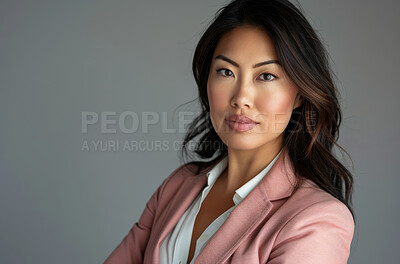 Asian woman, portrait and confident employee in studio, serious lawyer and pride on gray background. Female person, entrepreneur and mockup space for professional, attorney and career opportunity