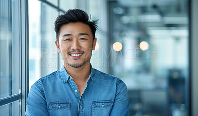 Asian man, portrait and smile in office building as business entrepreneur for tech startup, confidence or growth. Male person, face and pride for funding deal or professional, about us or workplace
