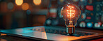 Laptop, lightbulb and business idea or invention solution as creative startup, visionary or digital app. Bokeh, bright and internet connection or inspiration growth, problem solving or entrepreneur