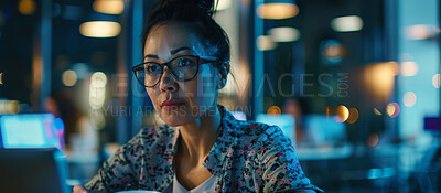 Night, busy and Asian woman in office, reading and market research for sales, copywriter and employee. Corporate, female worker and online for project, startup and workplace for essay or blog