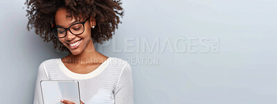 Black woman, tablet and happy in studio for social media, internet and good news. Fashion designer, technology and smile on isolated white background for online shopping, clothes and trendy style