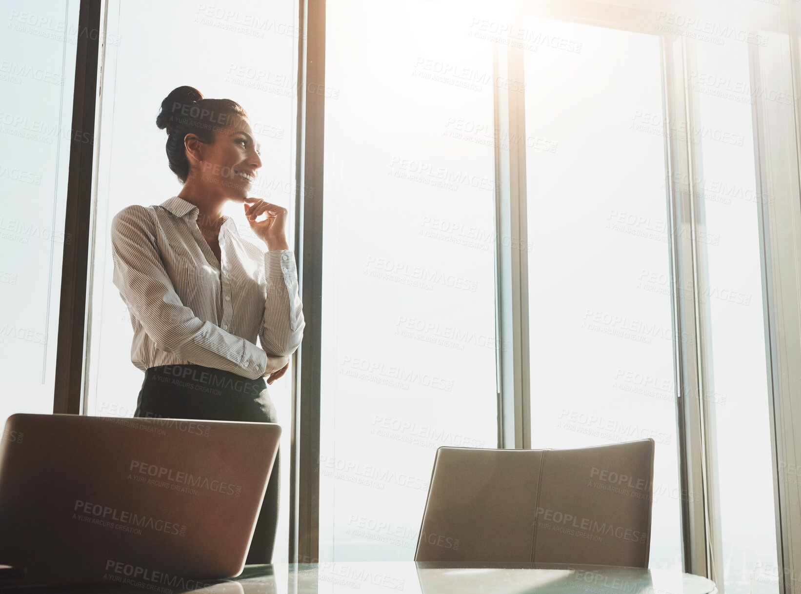 Buy stock photo Thinking, office and business woman by window with ideas, solution and insight for company. Corporate, entrepreneur and happy person with lens flare for problem solving, brainstorming and reflection