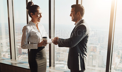 Buy stock photo Handshake, coffee and business people in office with deal, merger or b2b corporate partnership. Meeting, welcome and finance banker shaking hands with investment client for agreement in workplace.