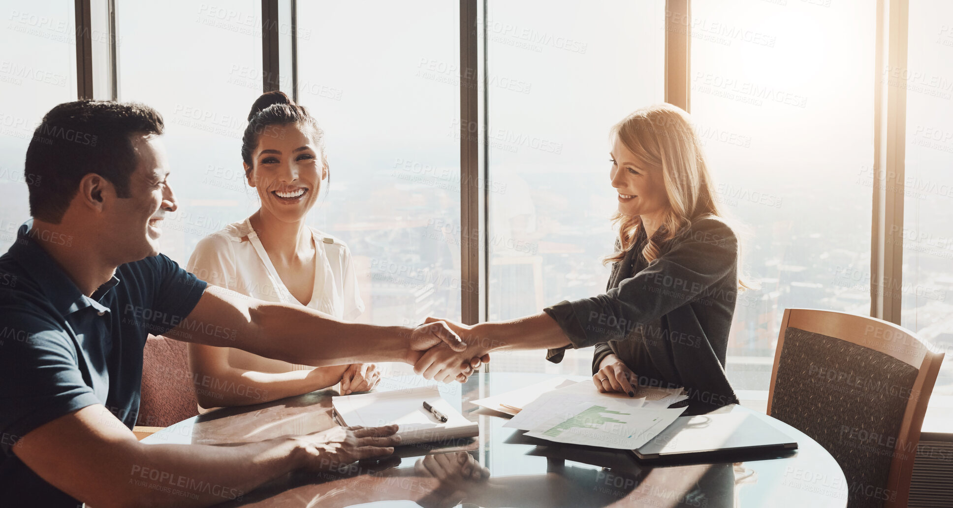 Buy stock photo Meeting, shaking hands and business people in office with documents for promotion and deal. Teamwork, man and women in conference room for collaboration and success for partnership in global company